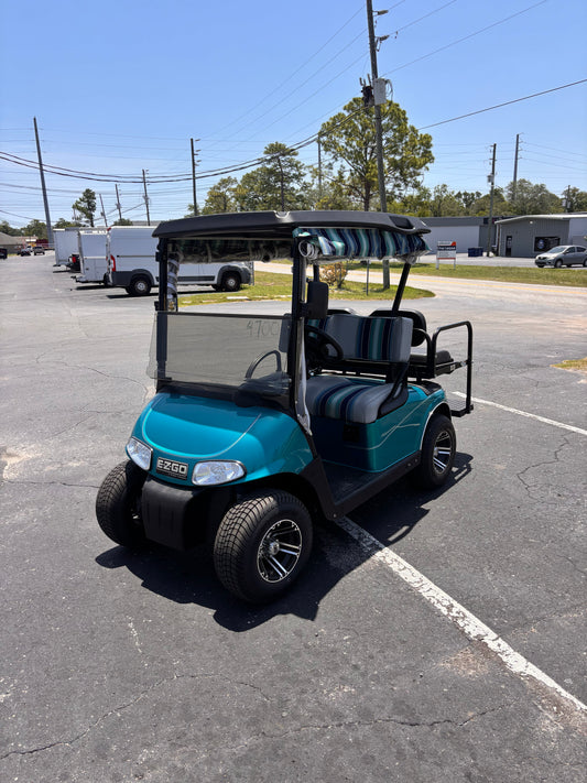 Turquoise 4 seater EZGO golf cart
