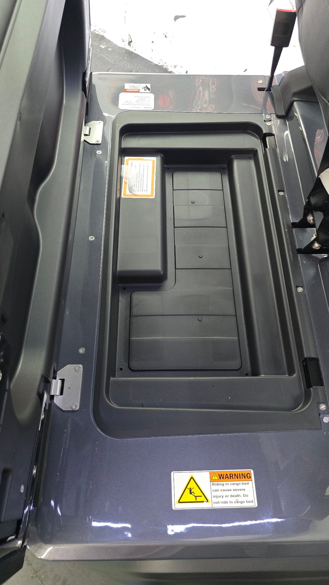 2026 EPIC E40FX Charcoal — rear storage compartment