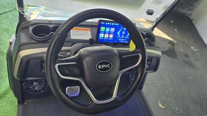 2026 EPIC E40FX Pearl White — steering wheel and dash
