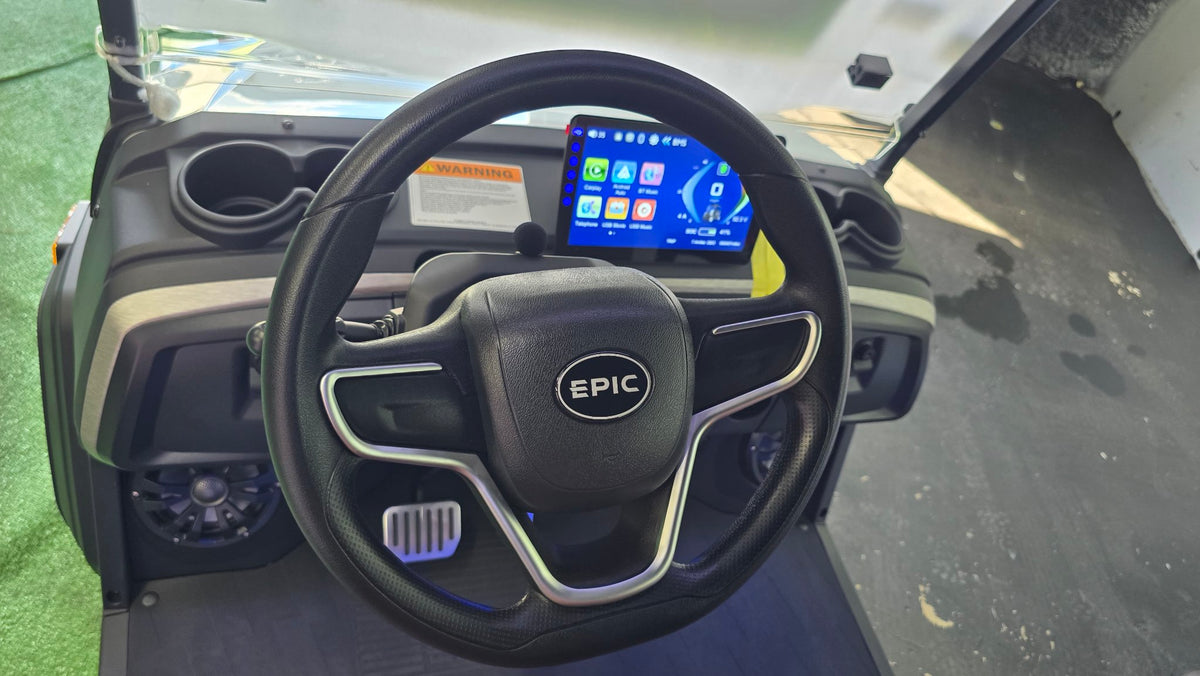 2026 EPIC E40FX Pearl White — steering wheel and dash