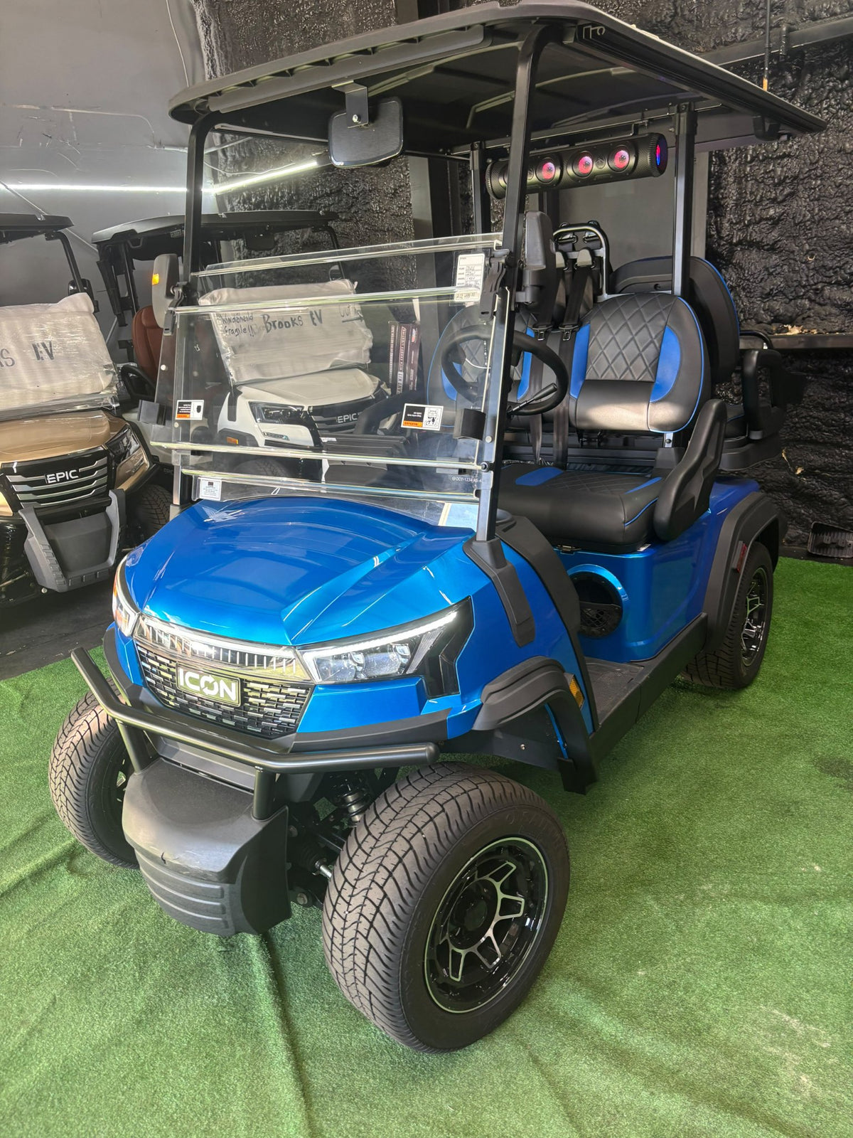 2026 ICON i40X Electric Blue — front three-quarter view, second angle