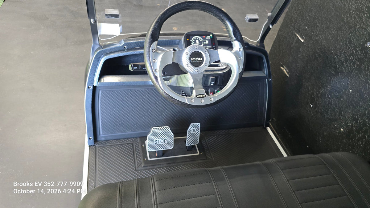 2025 ICON G60 Black — steering wheel and pedals